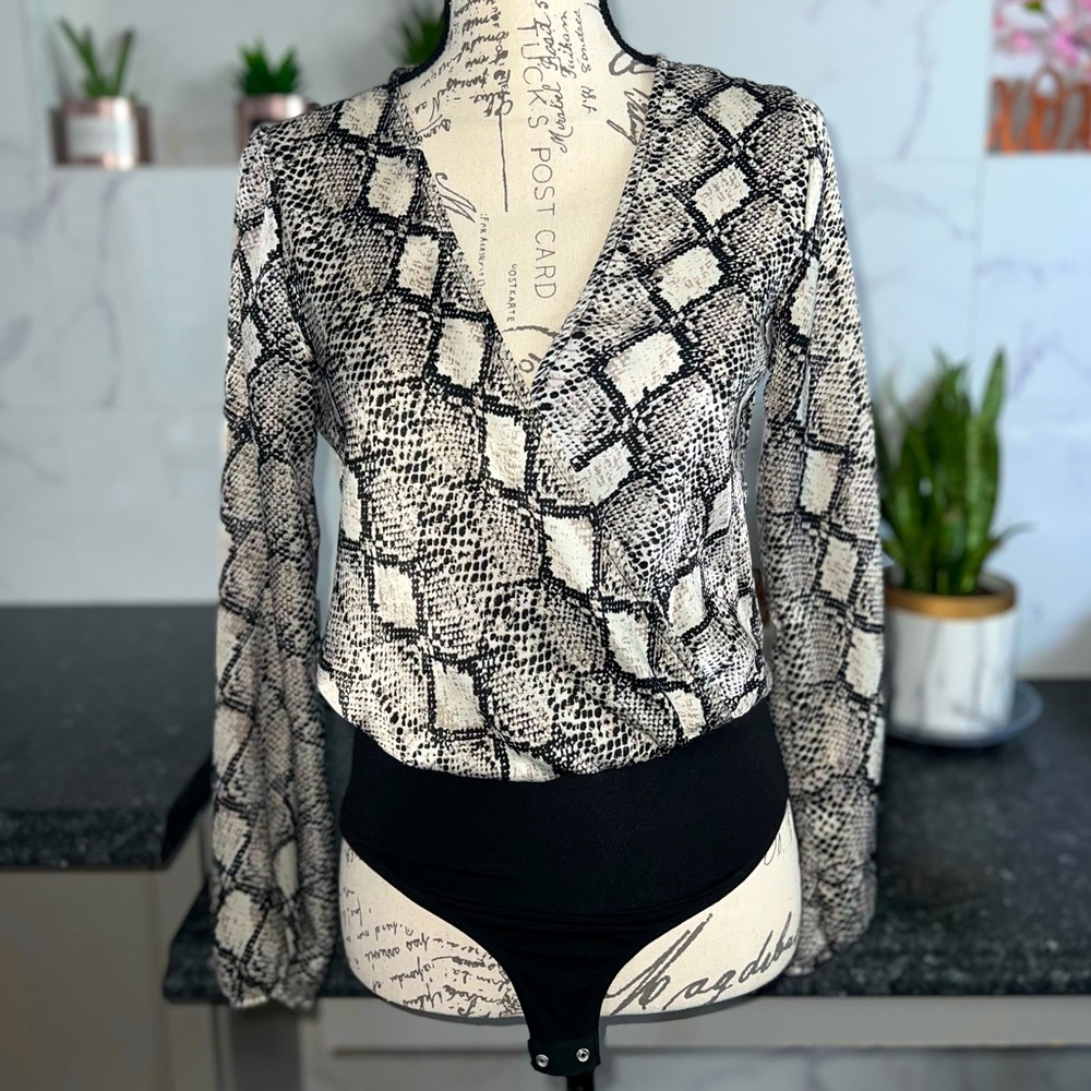 NWOT - Animal print, long sleeve, wrap bodysuit - SMALL